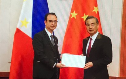 <p>Department of Foreign Affairs Secretary Alan Peter Cayetano (left) and Chinese Foreign Minister Wang Yi (right). </p>